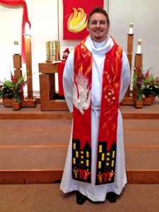 Peter Weston Miller wearing a red stole on his ordination